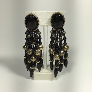 Black and gold tone earrings